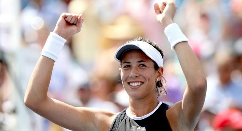 Garbine Muguruza of Spain celebrates her win at the WTA Cincinnati Open