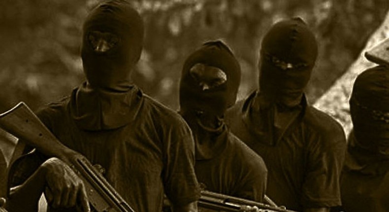 Unknown gunmen in face mask - Illustration purpose