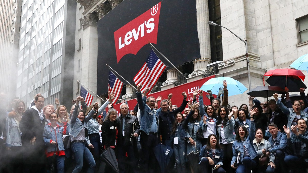 Levi Strauss & Co. CEO Chip Bergh and CFO Harmit Singh pose ahead of IPO outside the New York Stock 