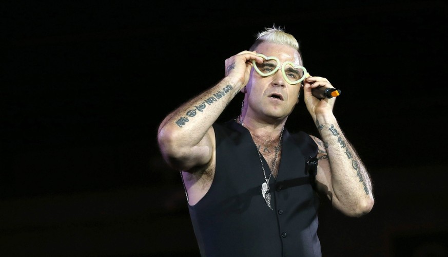 Robbie Williams podczas koncertu w Barclaycard Center w Madrycie