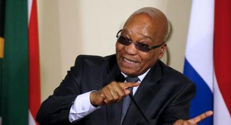 President of South Africa Jacob Zuma gestures during a news briefing at the Union Buildings in Pretoria, November 17, 2015.