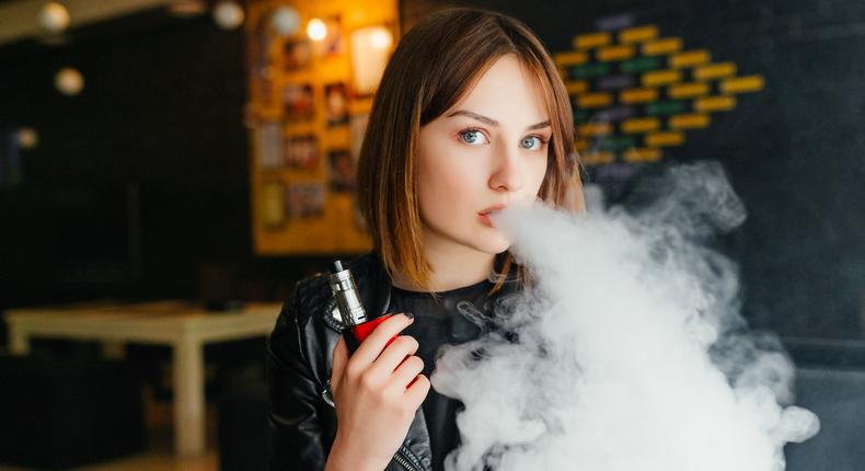 woman girl vaping staring eyes