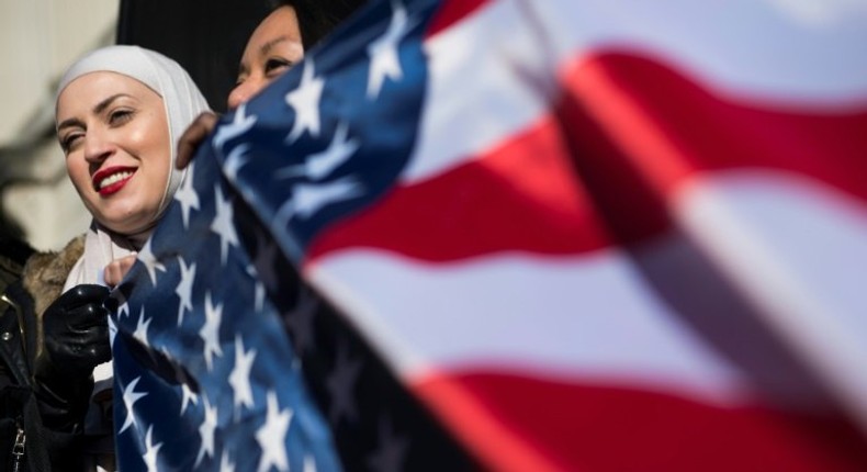 Zeina, who did not want to give her last name, takes part in a protest against US President Donald Trump outside the White House on February 4, 2017, in Washington, DC