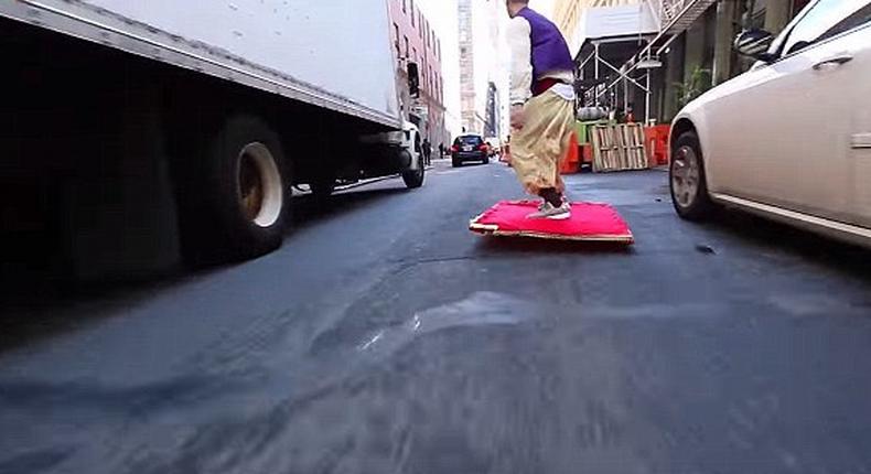 Watch Real life Aladdin glides down the street in a 'flying carpet'