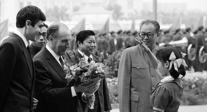 Chinese Premier Zhao Ziyang (R) with French President Francois Mitterrand on Beijing's Tiananmen Square in 1983