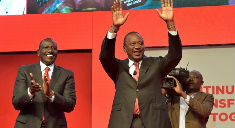 Deputy President William Ruto, left, with his running mate President Uhuru Kenyatta in June