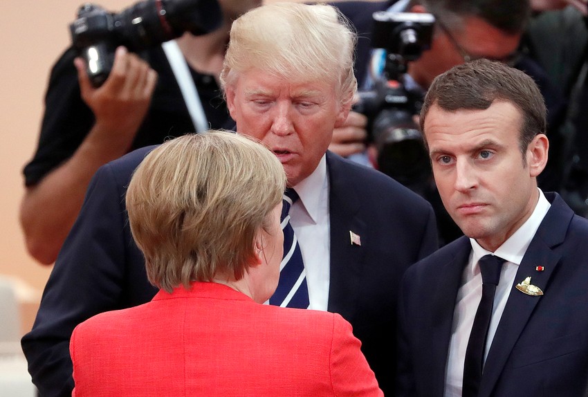 Američki i francuski predsednik Donald Tramp i Emanuel Makron (D) i nemačka kancelarka Angela Merkel na samitu G20 u Hamburgu u julu prošle godine