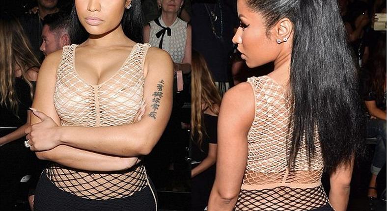 Rapper, Nicki Minaj, rocks mesh nude dress, flaunting curves