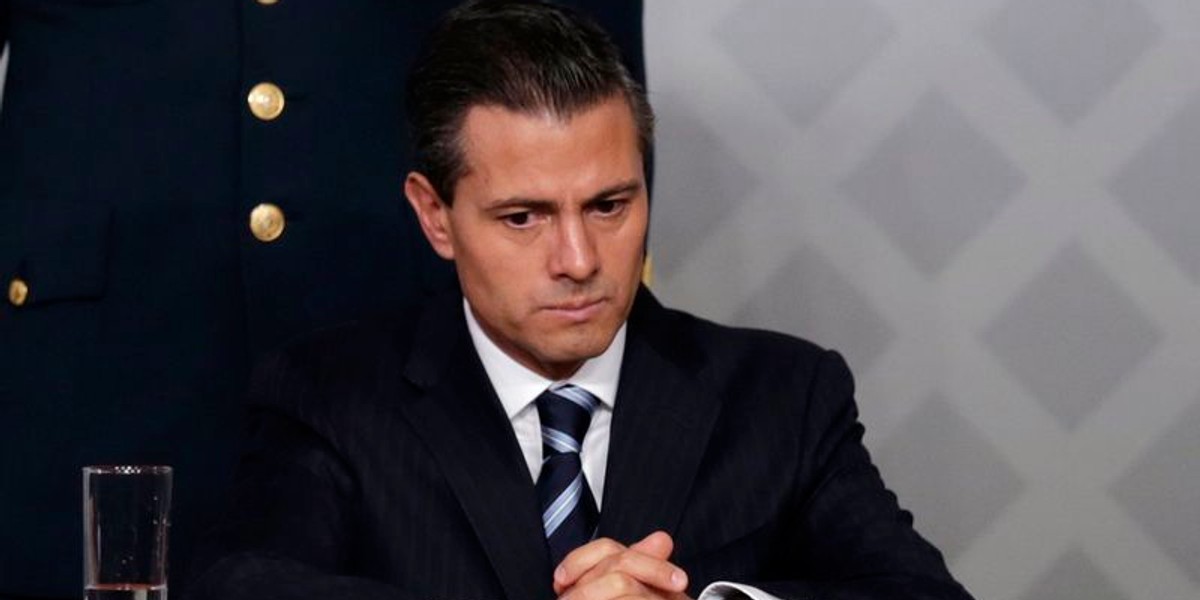 Mexico's President Enrique Pena Nieto sits during a meeting with lawyers in Mexico City