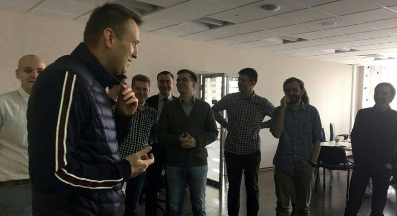 This handout picture obtained on April 10, from Leonid Volkov's Twitter account shows Alexei Navalny speaking with employees at the offices of his anti-corruption foundation in Moscow