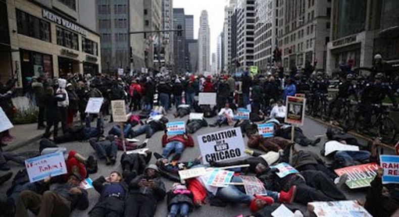 'Black Christmas' protesters demonstrate en-mass against police violence in Chicago