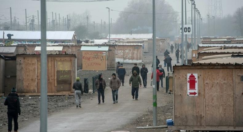 Migrants pictured inside the Grande-Synthe migrant camp in Grande-Synthe, near Dunkerque, northern France on January 25, 2017