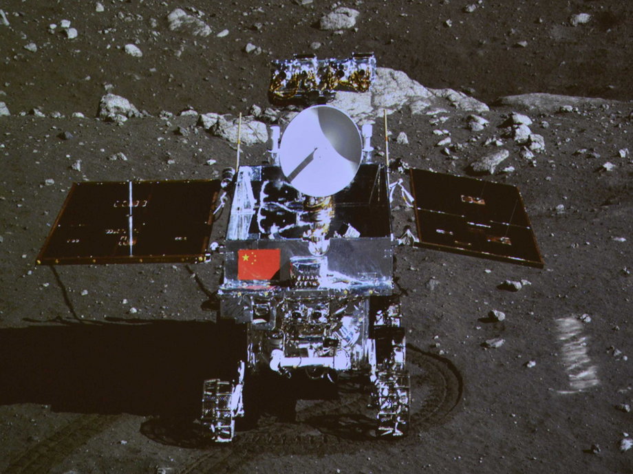 A photograph of the giant screen at the Beijing Aerospace Control Center shows a photo of the Yutu, or "Jade Rabbit" lunar rover taken by the camera on the Chang'e 3 probe during the mutual-photograph process.