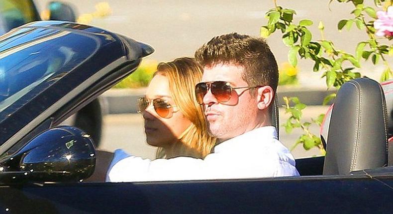 Robin Thicke and April Love Geary