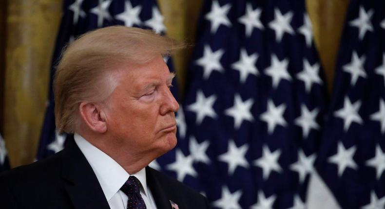 President Donald Trump listens during an event about the PREVENTS