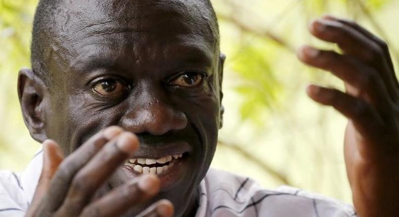 Opposition leader Kizza Besigye speaks during a news conference at his home at the outskirts of Kampala, Uganda, February 21, 2016. 
