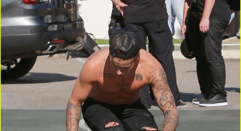 Justin Bieber goes shirtless while skateboarding in Santa Monica