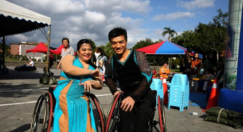 Ivy Huang (L) and Vincent Kuo (R) are part of the island's last generation of polio survivors and have spent years perfecting their dance routines