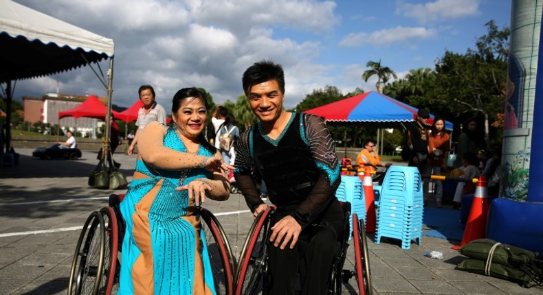 Ivy Huang (L) and Vincent Kuo (R) are part of the island's last generation of polio survivors and have spent years perfecting their dance routines