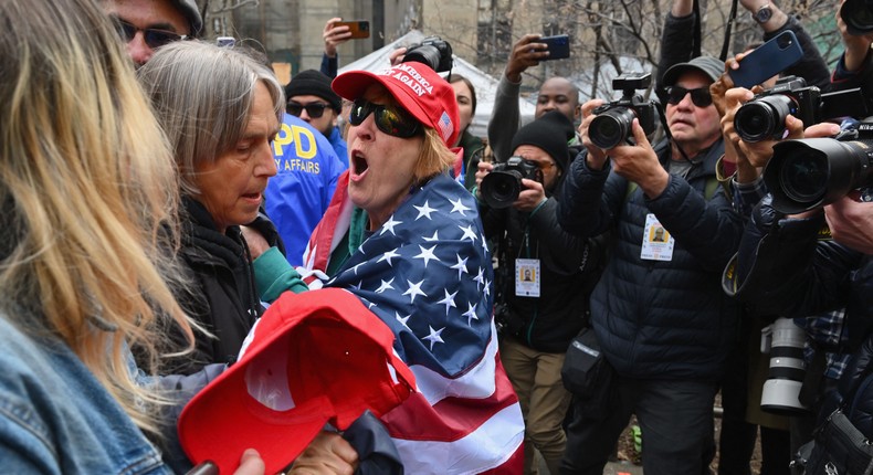 Pro and anti trump supporters face off during a protest outside of Manhattan Criminal Court in New York City on April 4, 2023.ANGELA WEISS/AFP via Getty Images