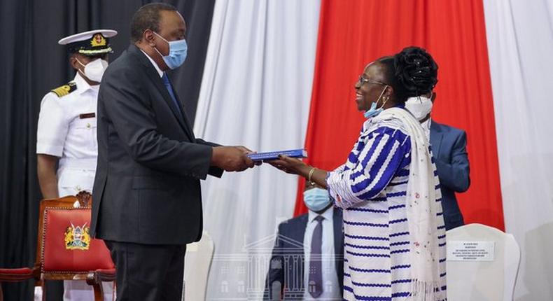 President Uhuru Kenyatta with Professor Fatuma Chege