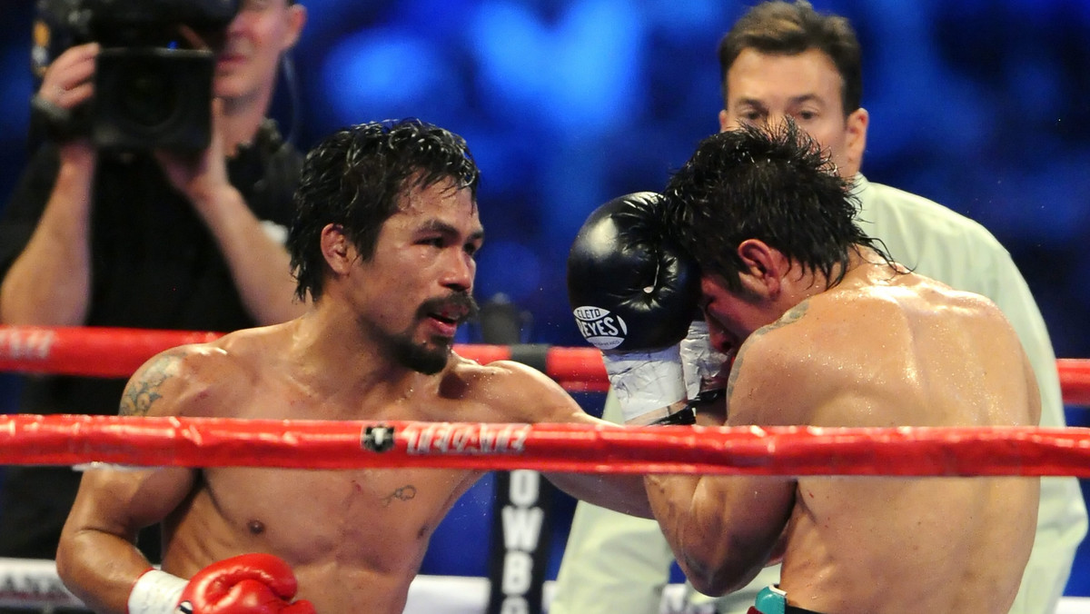 Podczas głównej walki wieczoru na gali w Arlington, uważany za najlepszego pięściarza globu Manny Pacquiao (52-3-2, 38 KO) zdecydowanie pokonał na punkty Antonio Margarito (38-7, 27 KO) i tym samym zdobył wakujący tytuł WBC w kategorii super półśredniej.