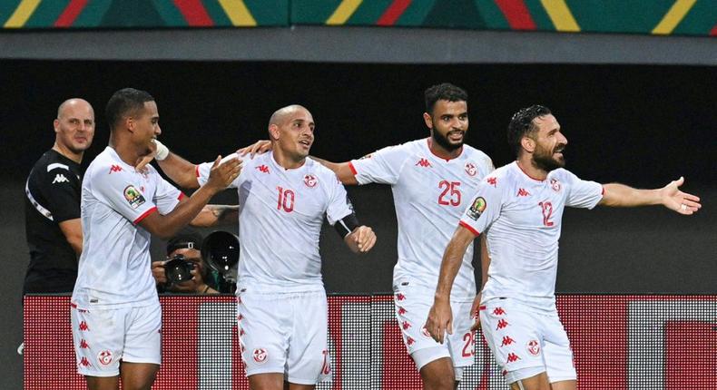 Tunisia captain Wahbi Khazri (2L) celebrates scoring against Mauritania Creator: Issouf SANOGO