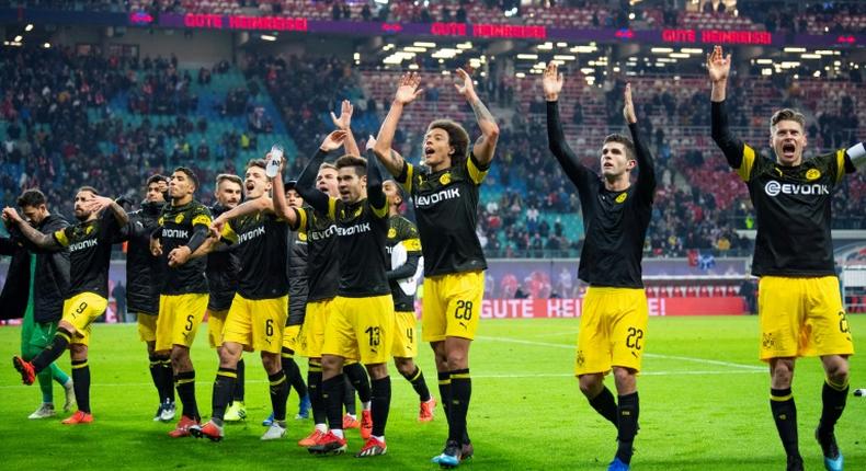 Belgian midfielder Axel Witsel (third from right) leads the celebrations after his goal at RB Leipzig kept Borussia Dortmund six points clear of Bayern Munich at the top of the Bundesliga.