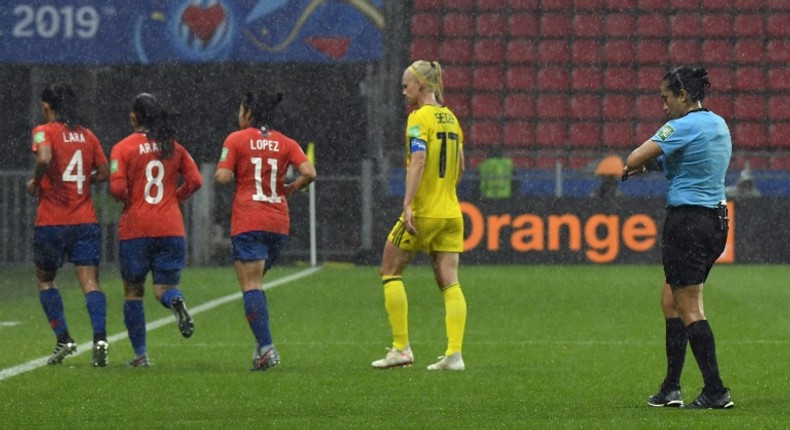 Rain forced a halt in play in the second half of Sweden's match against Chile at the women's World Cup on Tuesday