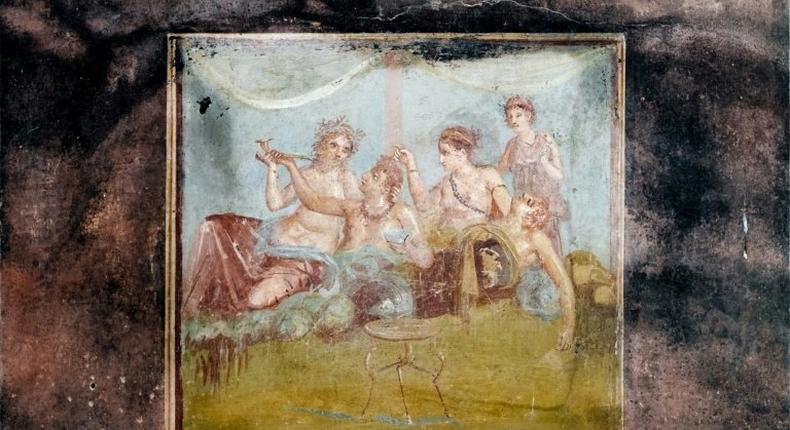 Fresco in the House of the Chaste Lovers, a rich baker's home, with garden, stables, mill and a sumptuous fresco of a tender kiss, in the ancient Roman city of Pompeii