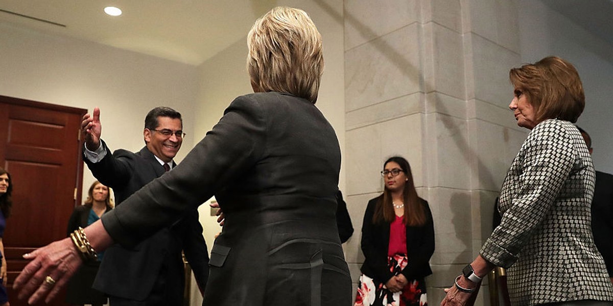 Rep. Xavier Becerra greets Hillary Clinton in Washington last year.