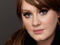 Adele usuwa się w cień