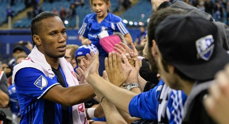 Didier Drogba of the Montreal Impact celebrates with fans during leg one of the MLS Eastern Conference finals against the Toronto FC at Olympic Stadium on November 22, 2016 in Montreal, Quebec, Canada