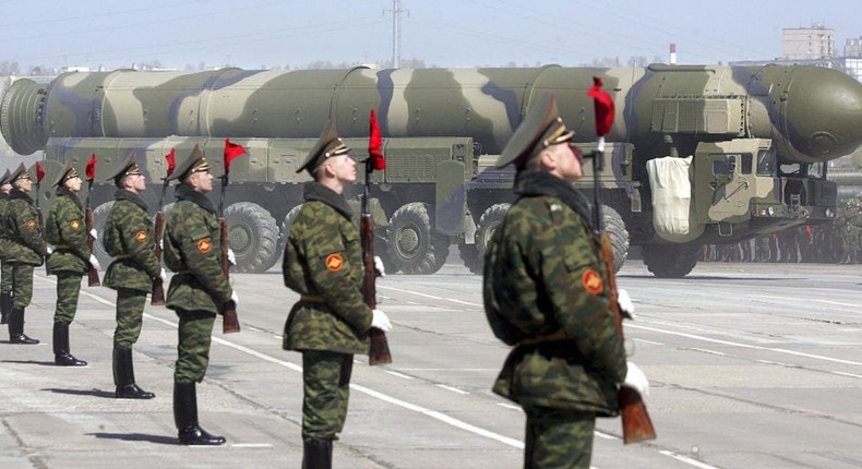 Russian soldiers stand near a Topol-M ICBM while participating in a rehearsal for the nation's Victory Day parade outside Moscow.ALEXANDER NEMENOV/AFP via Getty Images