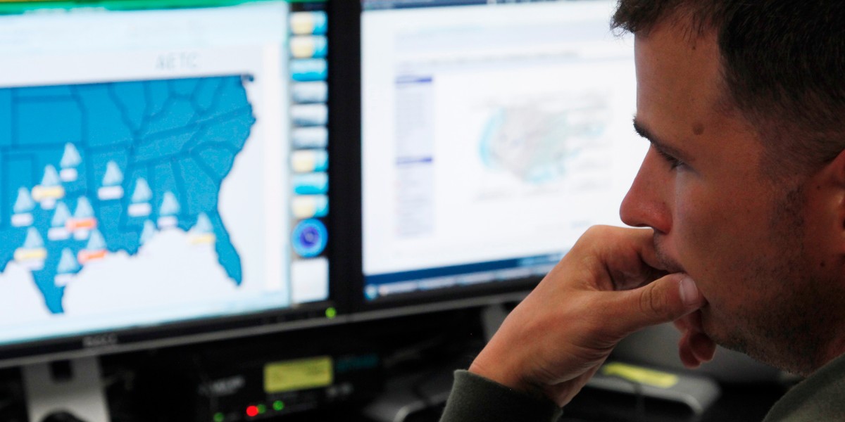 Josh Mayeux, a network defender, works at the US Air Force Space Command Network Operations & Security Center at Peterson Air Force Base in Colorado Springs, Colorado, on July 20, 2010.