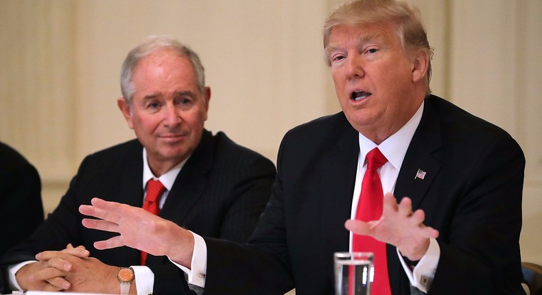 Blackstone Group CEO Steve Schwarzman (left) with President Trump (right).