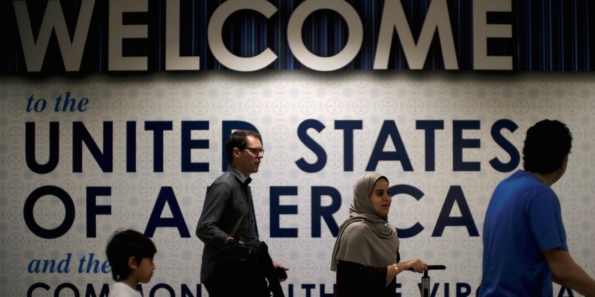 International passengers arrive at Washington Dulles International Airport after the U.S. Supreme Court granted parts of the Trump administration's emergency request to put its travel ban into effect later in the week pending further judicial review, in Dulles, Virginia, U.S., June 26, 2017.