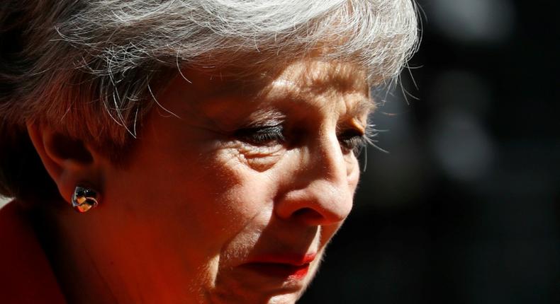 Britain's Prime Minister Theresa May said she would step down as Conservative Party leader on June 7