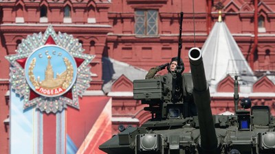 Russian servicemen drive T-90A main battle tank during Victory Day parade to mark end of World War T