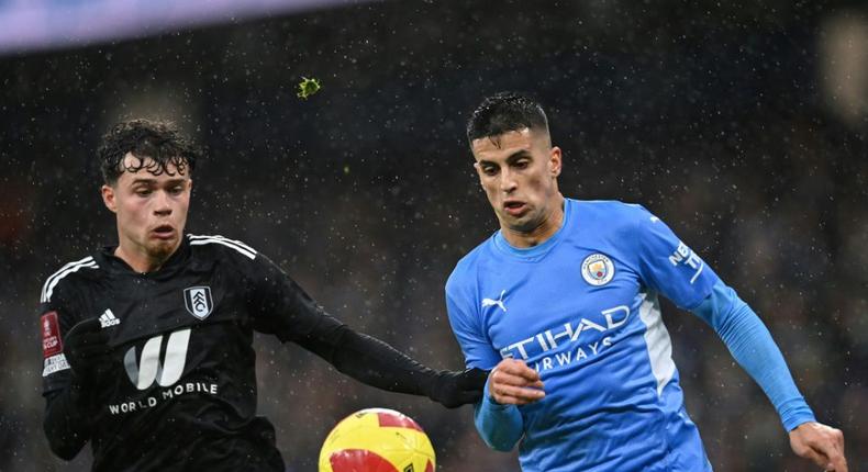 Joao Cancelo (right)has become one of Manchester City's most important players Creator: Paul ELLIS