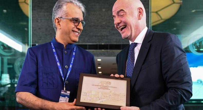 AFC president Sheikh Salman bin Ebrahim al Khalifa (L, with FIFA president Gianni Infantino) has held the job since 2013 but will face two challengers at election in April