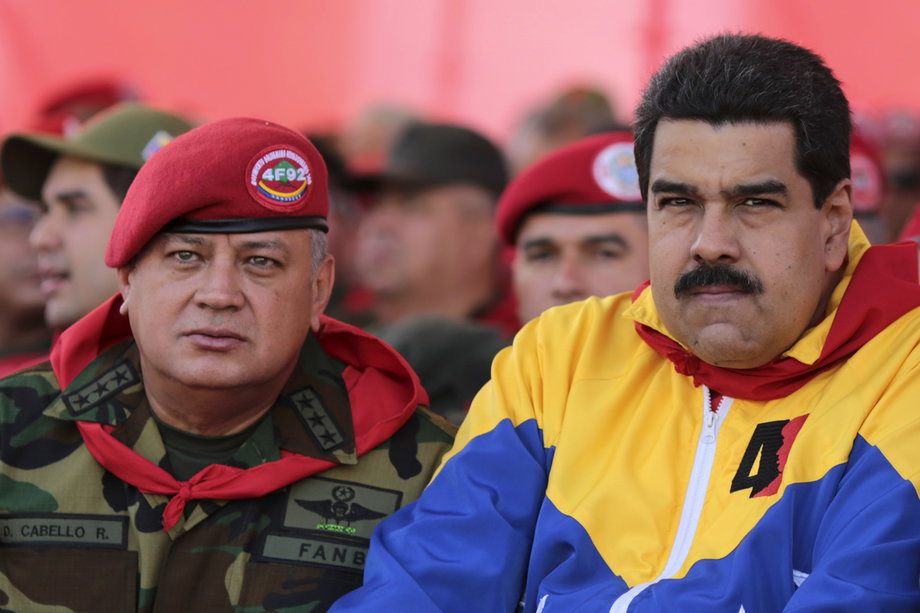 Venezuelan President Nicolas Maduro, right, and then National Assembly President Diosdado Cabello at a parade commemorating the 23rd anniversary of the coup attempt by late President Hugo Chavez, February 4, 2015.