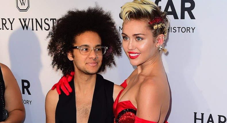 Tyler Ford and Miley Cyrus at the amfAR Inspiration Gala