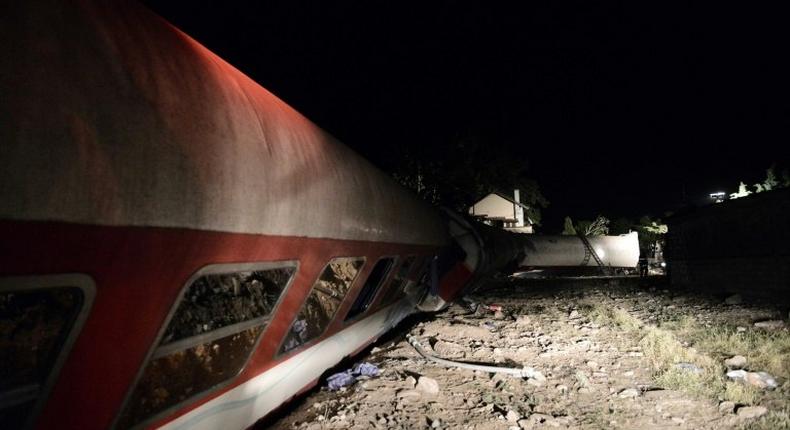 Derailed wagons from a train lie on the ground near the village of Adendro, some 40 km west of Thessaloniki, in northern Greece on May 14, 2017