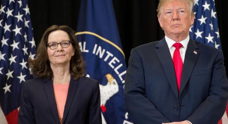 Donald Trump stands alongside Gina Haspel before she is sworn-in as Director of the Central Intelligence Agency during a ceremony at CIA Headquarters in Langley, Virginia, May 21, 2018.