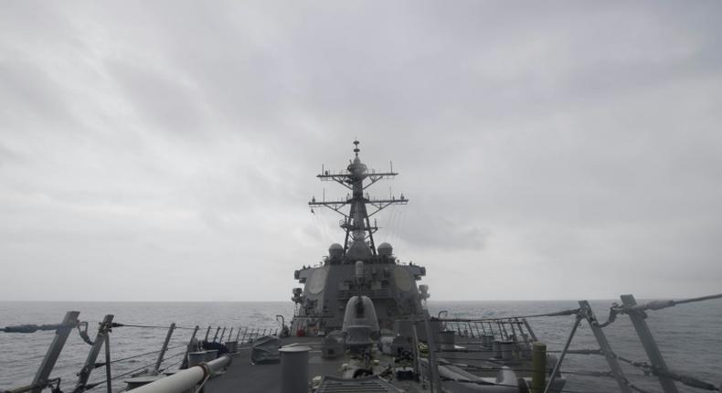 The US military has been using guided-missile destroyers like this one, the USS John McCain, seen here in a US Navy photo, as it seeks to enforce an international 'freedom of operation' near islands claimed by Beijing in the South China Sea