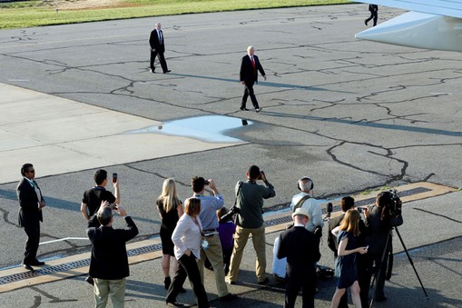 President Donald Trump boards Air Force One at Morristown municipal airport in New Jersey