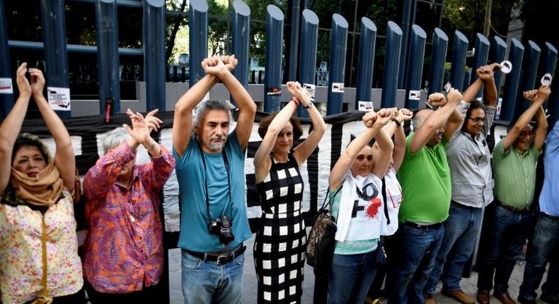 Leaders of Mexico's conservative party were targeted by the same spyware that the government is accused of using against journalists, an allegation that sparked protest from civil society activists and journalists, pictured on June 23, 2017