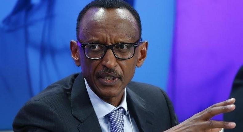 Rwanda President Paul Kagame gestures during the session 'Ending Poverty through Parity' in the Swiss mountain resort of Davos January 24, 2015. REUTERS/Ruben Sprich