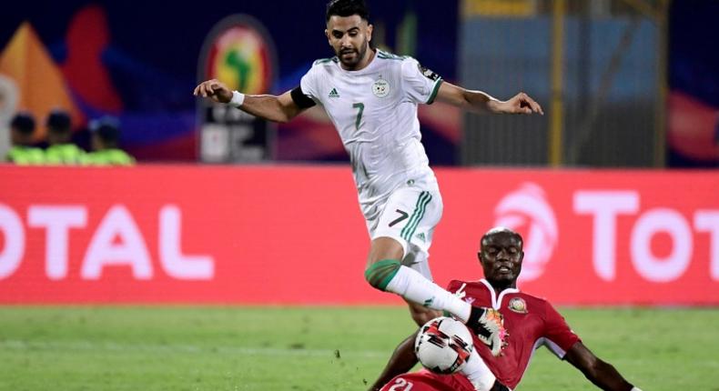 Algeria and Manchester City winger Riyad Mahrez takes the ball past Kenyan Dennis Odhiambo in an Africa Cup of Nations match won 2-0 by the Desert Foxes
